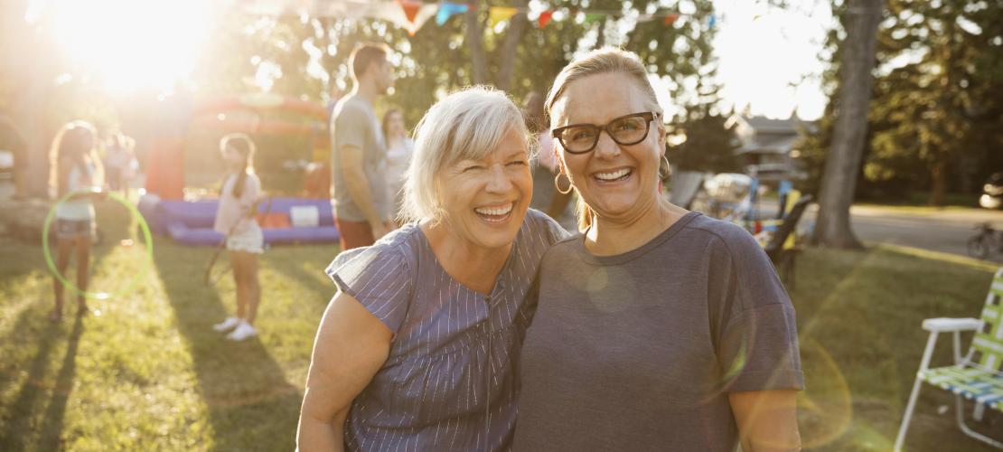 Women smiling in park