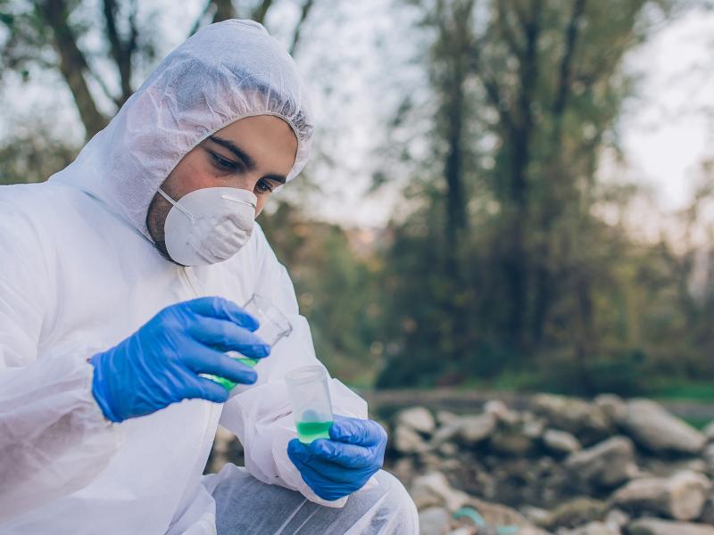 Scientist inspecting water quality